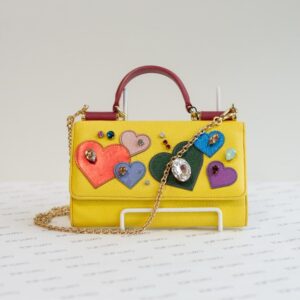 Clutch Dolce & Gabbana amarela apliques