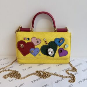 Clutch Dolce & Gabbana amarela apliques