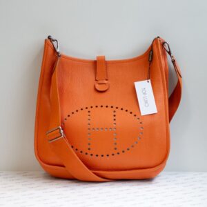 Bolsa Hermès laranja Evelyne 33
